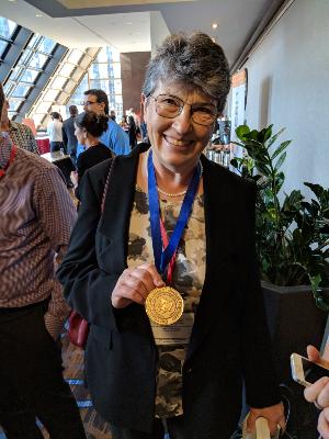 Dr. Anna Celler being recognized with the Canadian Organization of Medical Physicists Gold Medal in 2018